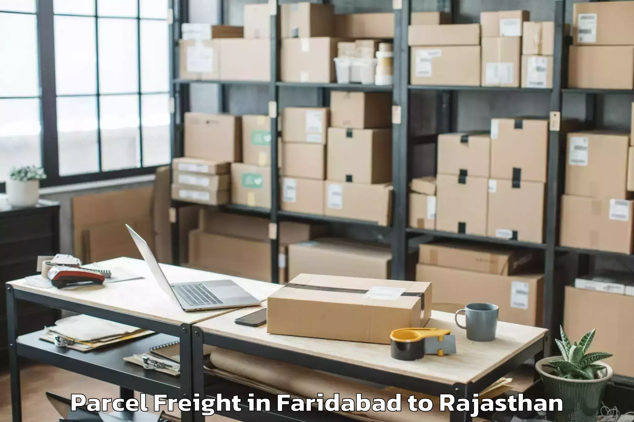 Top Faridabad to Padampur Parcel Freight Available